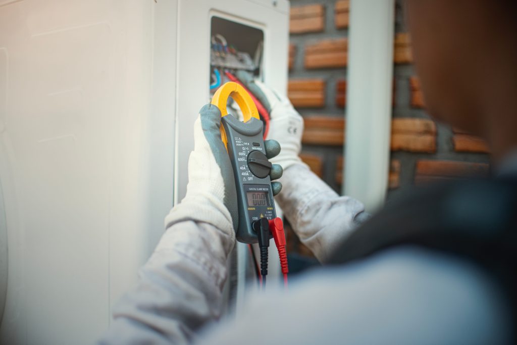 Vecteezy Technician Holding A Voltage Meter Performing Preventative 19196913 1024x683