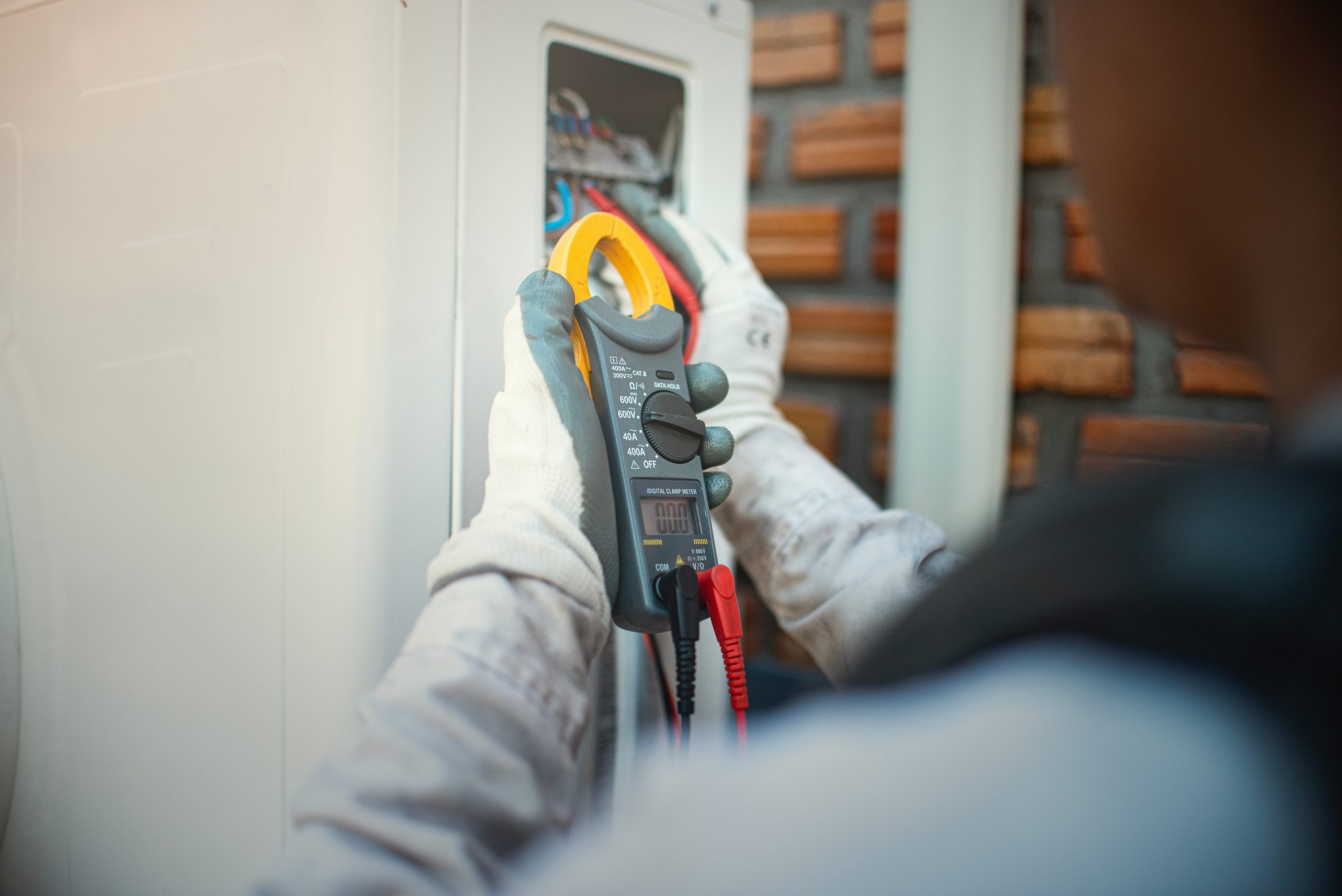 Vecteezy Technician Holding A Voltage Meter Performing Preventative 19196913 Scaled